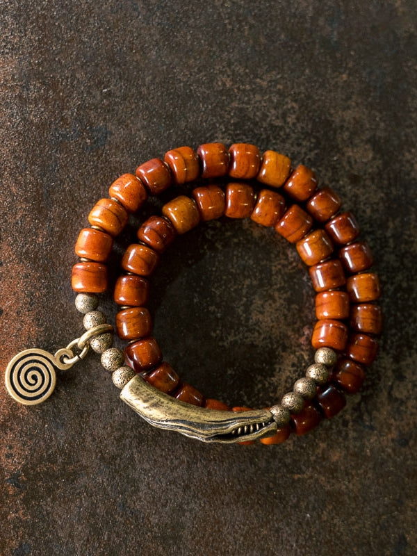 Flame Guardian Bracelet – Red Bone Beads with Vintage Brass Charm | Courage & Protection
