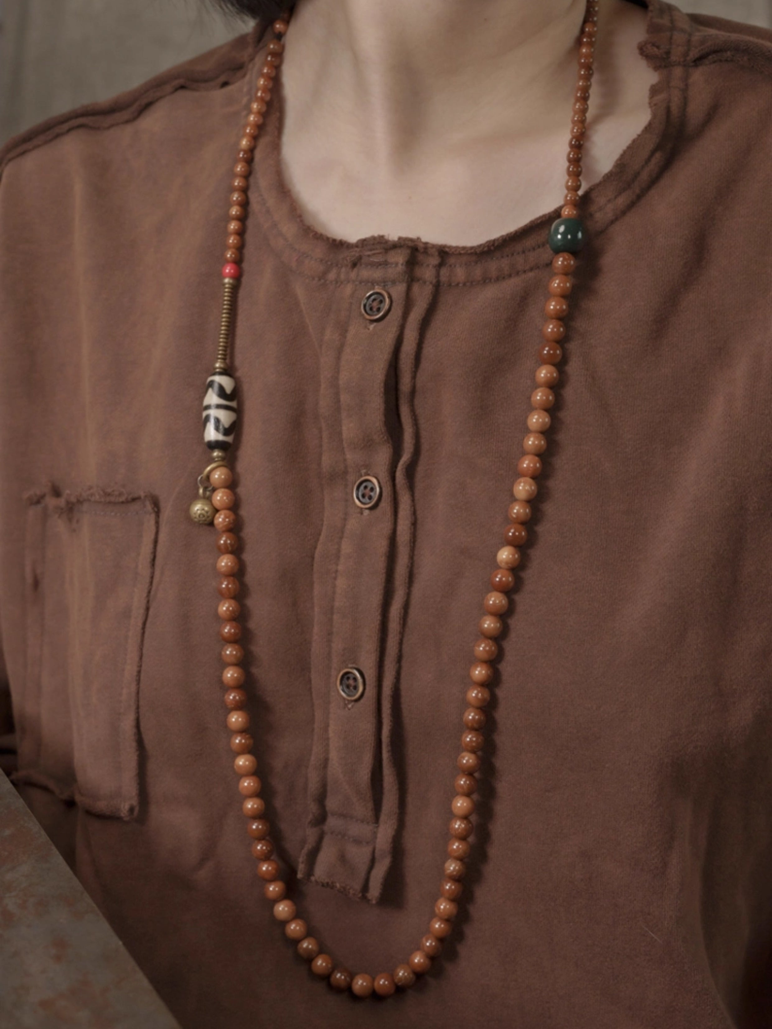 Path of Guardianship – Kuku Wood & Alxa Agate Necklace with Vintage Brass and Tiger Tooth Accents
